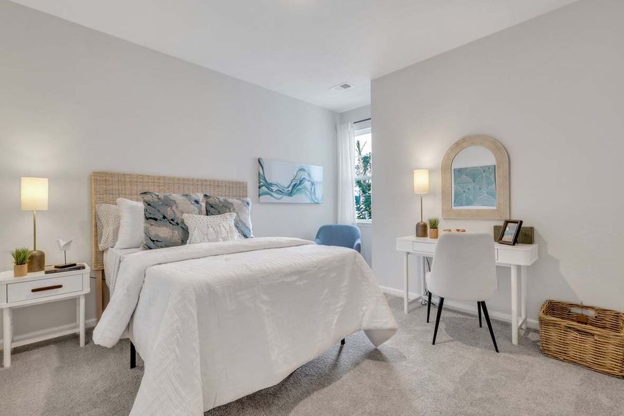 Representative furnished interior of a home built from the TUSCAN by D.R. Horton in Westbrook Retreat Villas at Savannah Quarters, Pooler (Image 27).