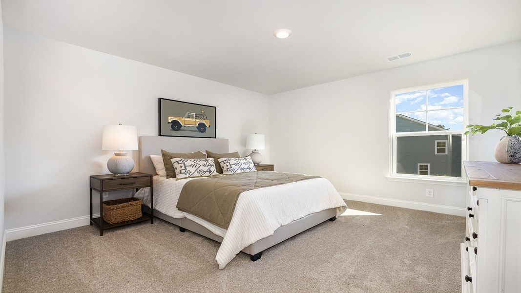 Furnished interior view inside a new home in Brunswick Plantation, Ash (Image 14).
