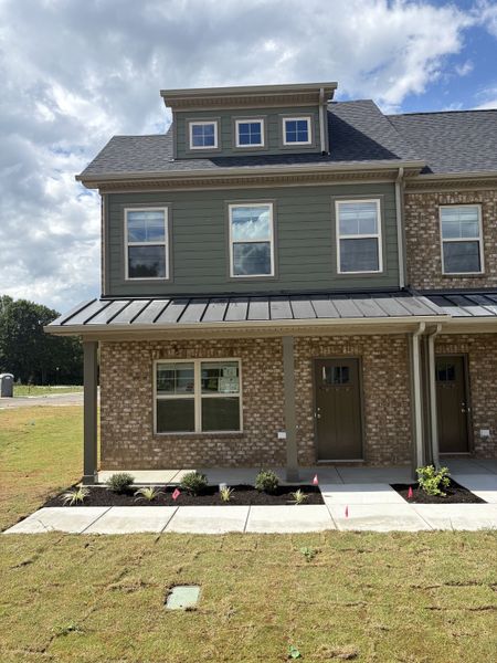 Front exterior of a new home in Talia Trace, Smyrna, TN, highlighting curb appeal (Image 1).