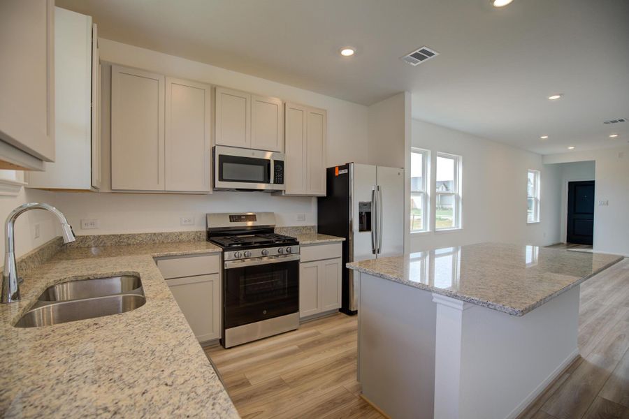 Furnished interior view inside a new home in Mason Woods, Cypress (Image 6).
