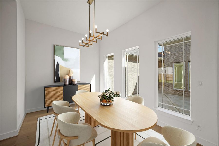 An elegant dining room with a sparkling chandelier, offering a scenic view of the serene courtyard. An elegant dining room with a sparkling chandelier, offering a scenic view of the serene courtyard.