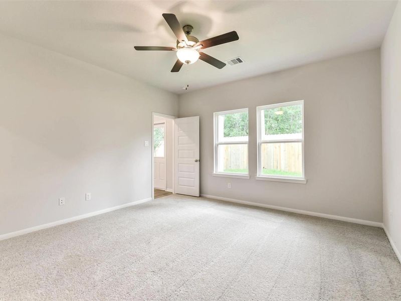 Spacious, unfurnished interior of a new home in Caney Creek Place, Conroe (Image 21).