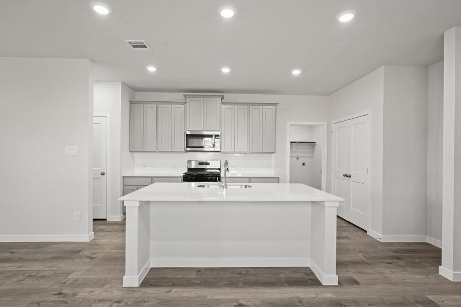 Furnished interior view inside a new home in Lakes at Black Oak, Magnolia (Image 11). Furnished interior view inside a new home in Lakes at Black Oak, Magnolia (Image 11).