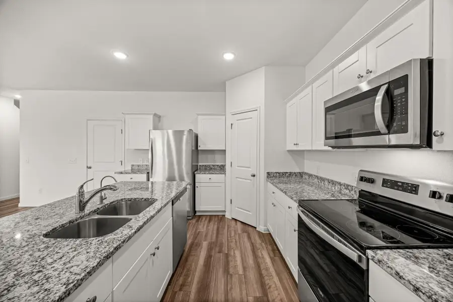 Furnished interior view inside a new home in Cottonwood Farms, Hutto (Image 5).
