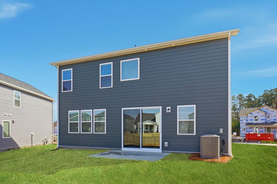 Exterior details and patio area of a home in Waxhaw Landing, Monroe (Image 3).