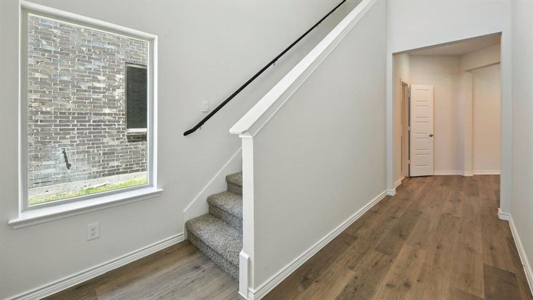 Stairway with wood finished floors
