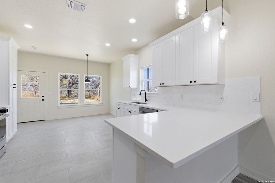 Furnished interior view inside a new home in , Floresville (Image 10).