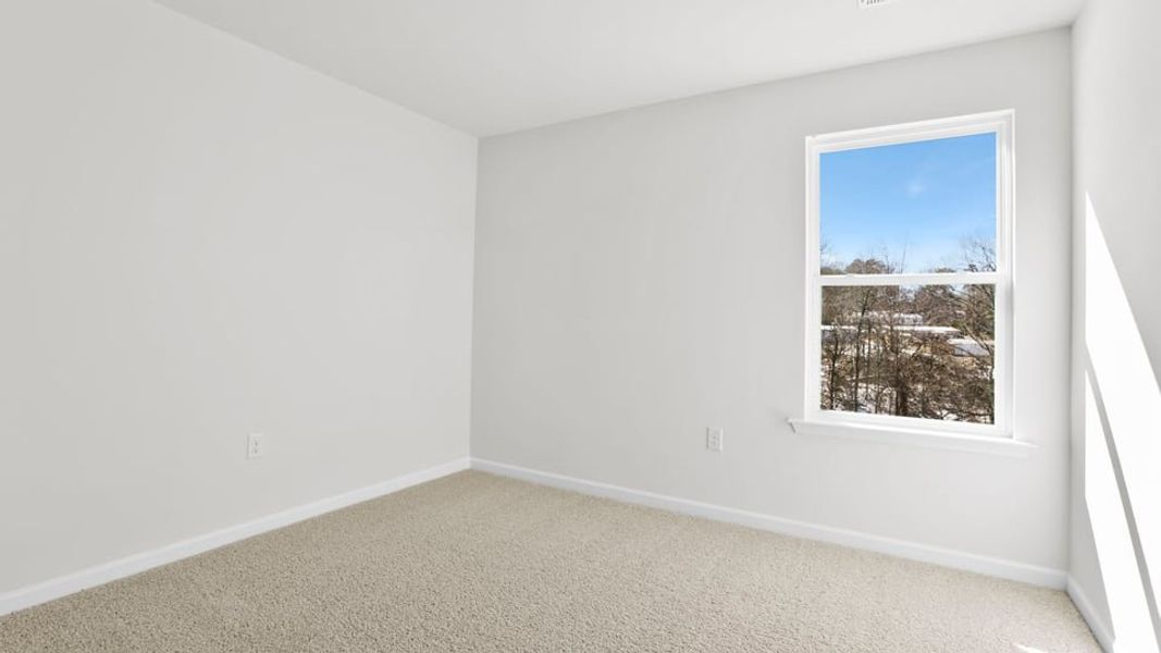 Spacious, unfurnished interior of a new home in Village Grove, Greenville (Image 25).