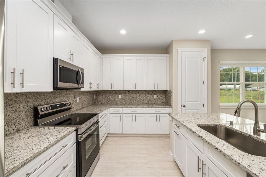 Furnished interior view inside a new home in , Summerfield (Image 15). Furnished interior view inside a new home in , Summerfield (Image 15).