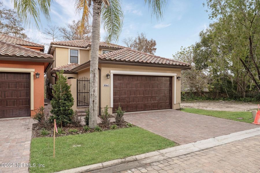 Front exterior of a new home in , Jacksonville, FL, highlighting curb appeal (Image 1). Front exterior of a new home in , Jacksonville, FL, highlighting curb appeal (Image 1).