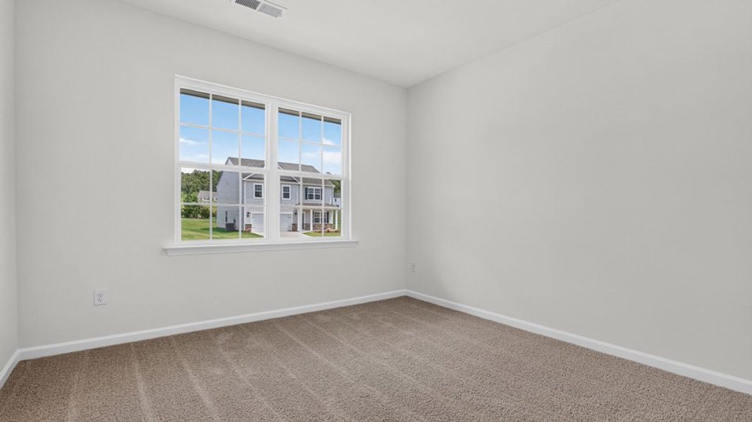 Spacious, unfurnished interior of a new home in The Reserve at Prestleigh, Wake Forest (Image 22).