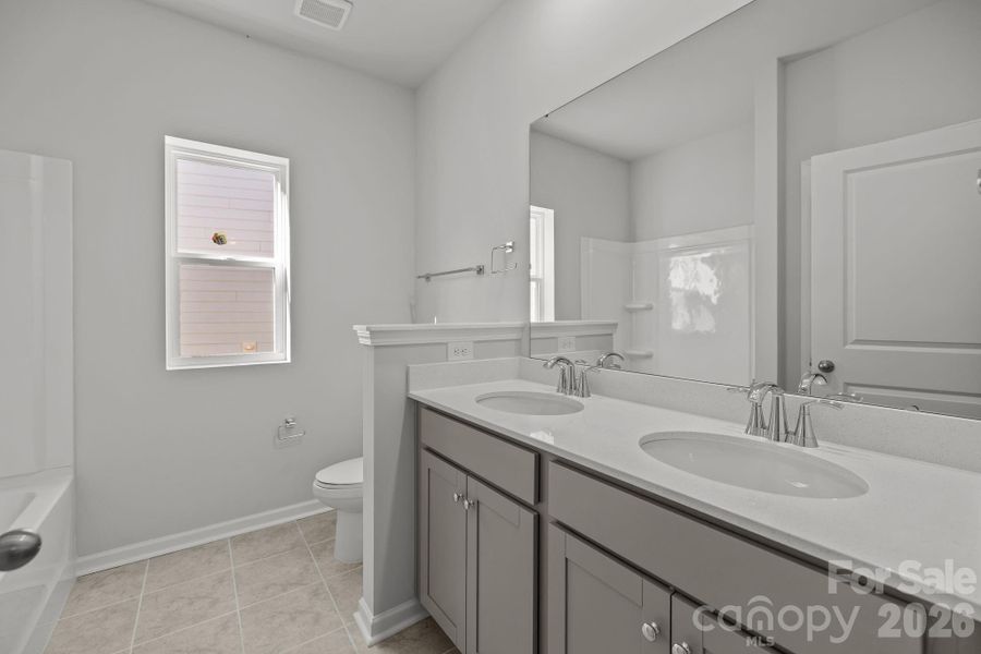 Furnished interior view inside a new home in Cottages at Wingate, Wingate (Image 9). Furnished interior view inside a new home in Cottages at Wingate, Wingate (Image 9).