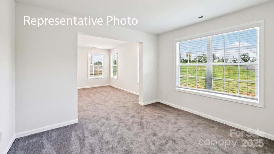 Spacious, unfurnished interior of a new home in Sanctuary at Southgate, Indian Trail (Image 20).