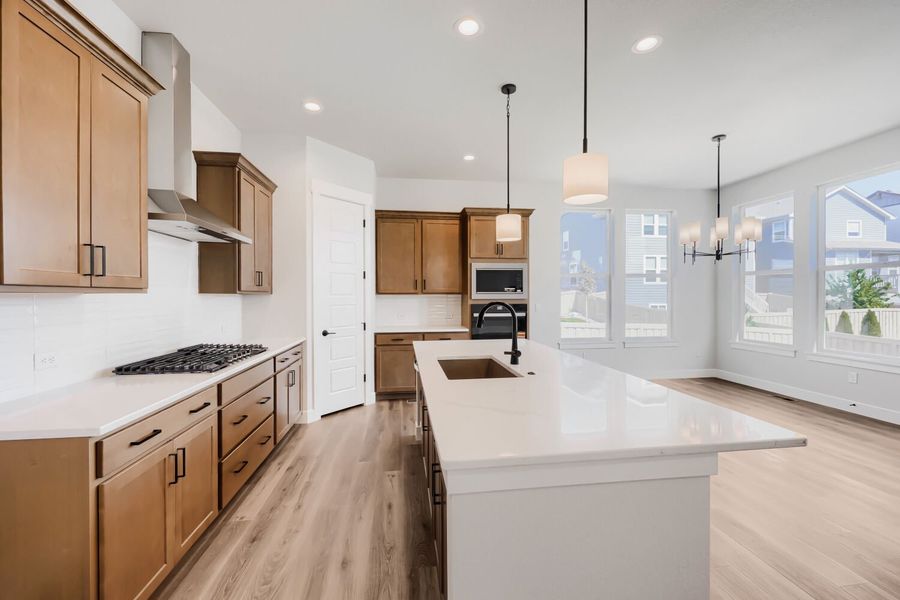 Plan C410 Representative Photo - Kitchen/Dining Area