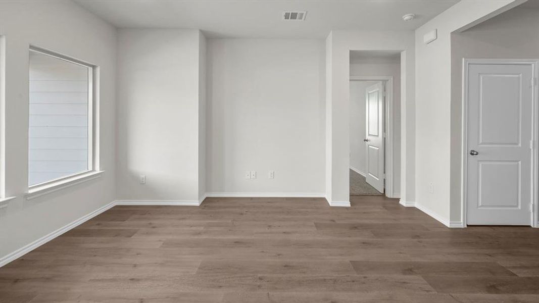 Unfurnished room with dark wood finished floors