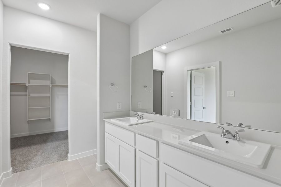 Primary Bedroom in the Holden home plan by Trophy Signature Homes
