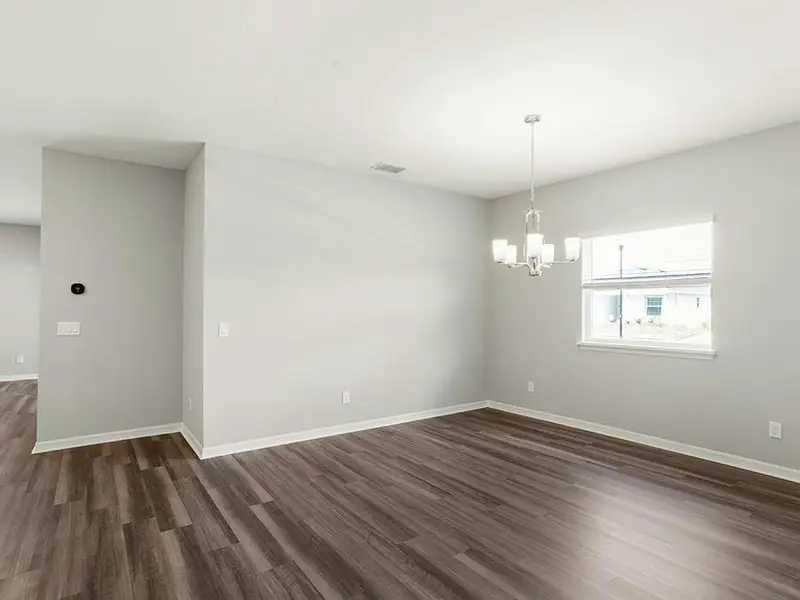 A dining room is located adjacent to the kitchen.
