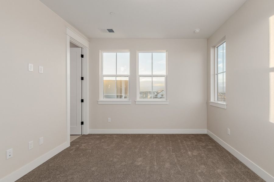 Representative unfurnished interior of a home built from the Luxe by Scott Felder Homes in Westerly, Erie (Image 47).