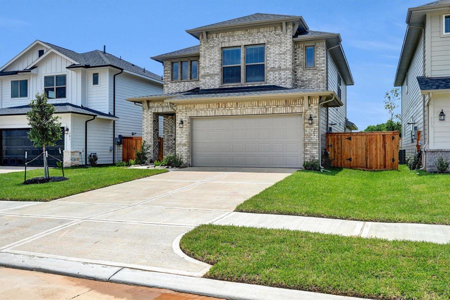 Front exterior of a new home in La Segarra 40', Brookshire, TX, highlighting curb appeal (Image 18).