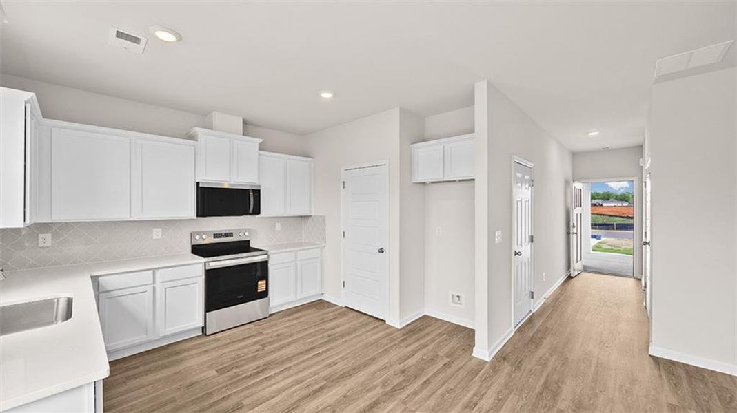 Furnished interior view inside a new home in Remington Chase, Perry (Image 4).