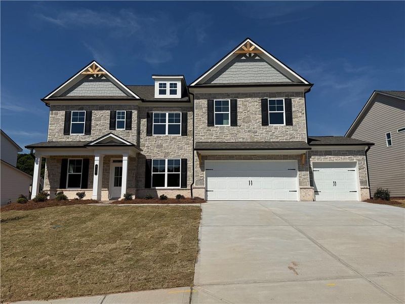 Front exterior of a new home in Rosewood Lake Estates, Hoschton, GA, highlighting curb appeal (Image 23).