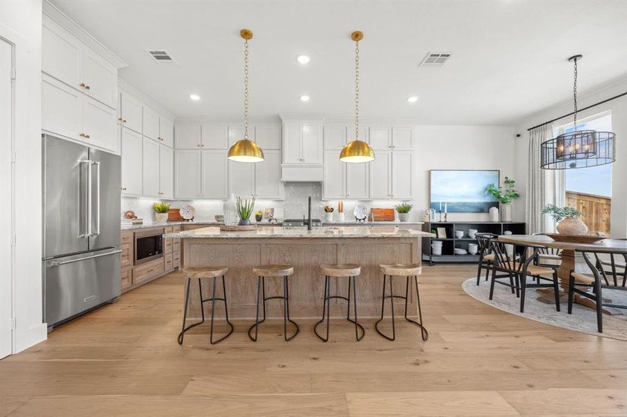 Furnished interior view inside a new home in North Square at Uptown, Celina (Image 10).