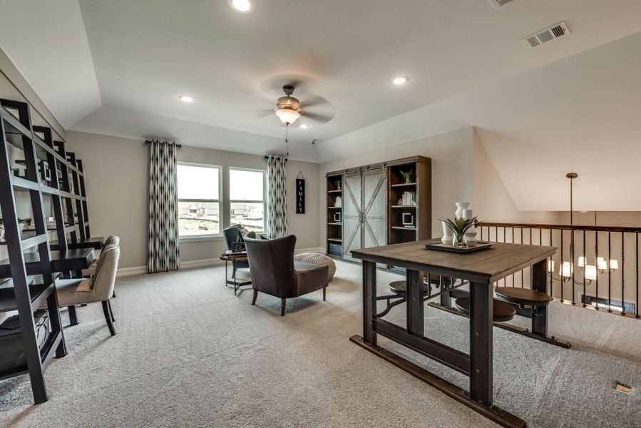 Representative furnished interior of a home built from the Harvard by Pulte Homes in Wellington, Fort Worth (Image 14).