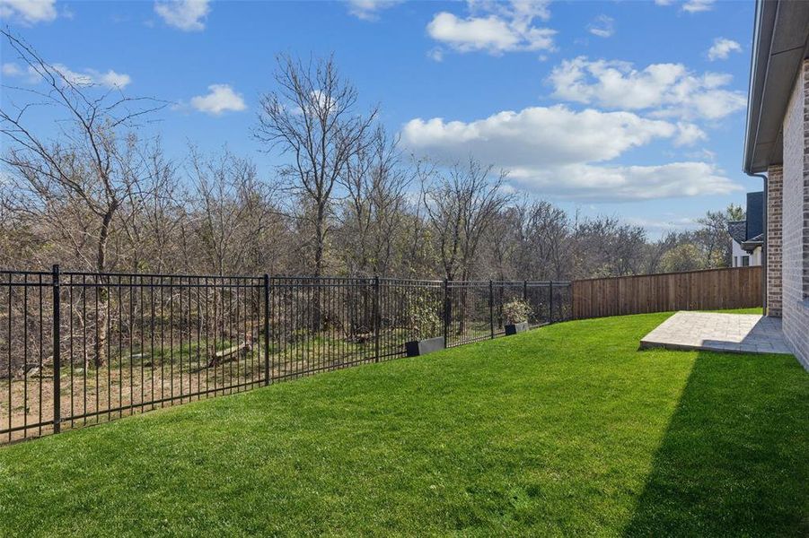 Exterior details and patio area of a home in , Aubrey (Image 4).