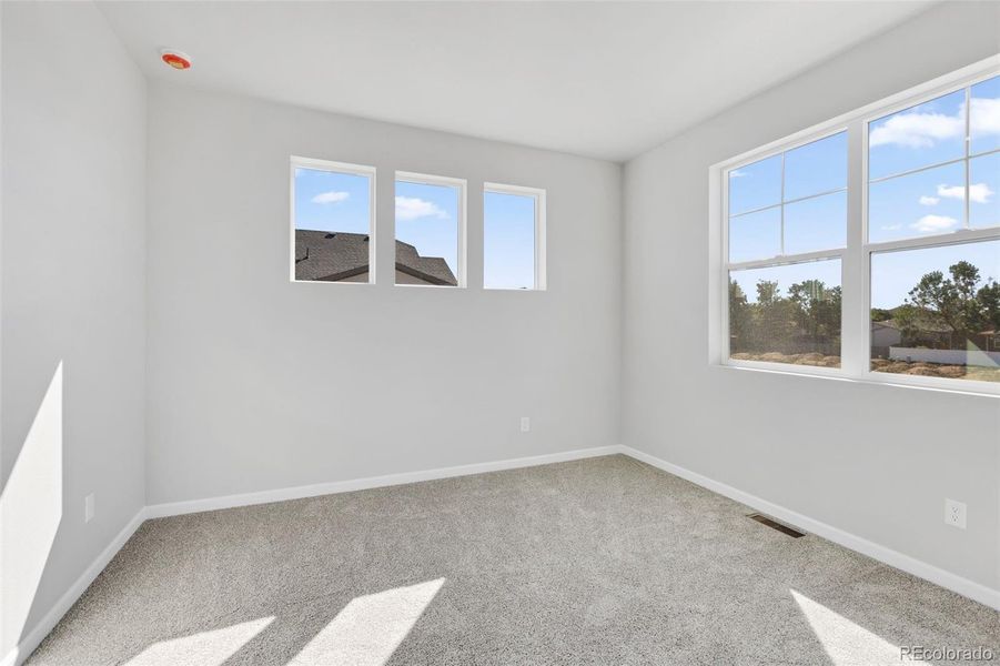Spacious, unfurnished interior of a new home in Cherry Meadows, Brighton (Image 25).