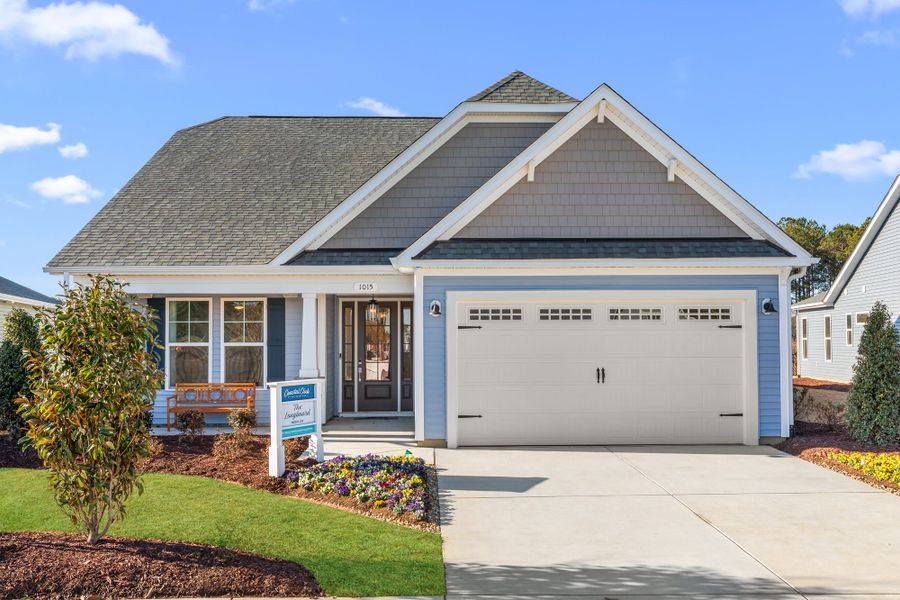 Representative exterior photo of a completed home built from the The Longboard by Chesapeake Homes in Terrapin, Leland, NC (Image 2). Representative exterior photo of a completed home built from the The Longboard by Chesapeake Homes in Terrapin, Leland, NC (Image 2).