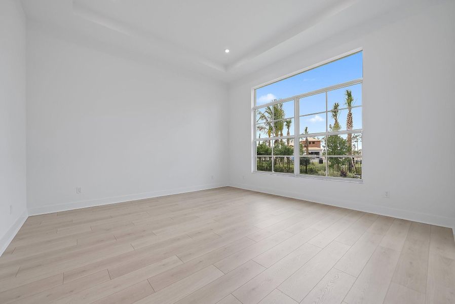 Spacious, unfurnished interior of a new home in L'Ambiance at Avenir, Palm Beach Gardens (Image 21).