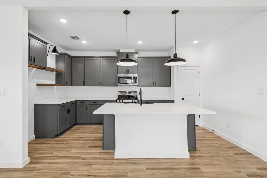 Gourmet kitchen (*Photo not of actual home and used for illustration purposes only.)