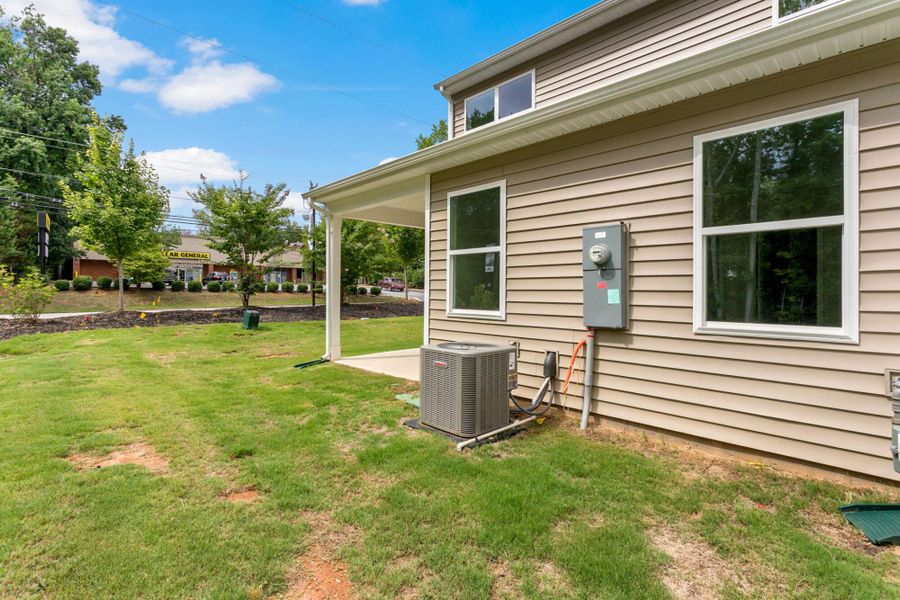 Exterior details and patio area of a home in East Main Townes, Spartanburg (Image 19). Exterior details and patio area of a home in East Main Townes, Spartanburg (Image 19).
