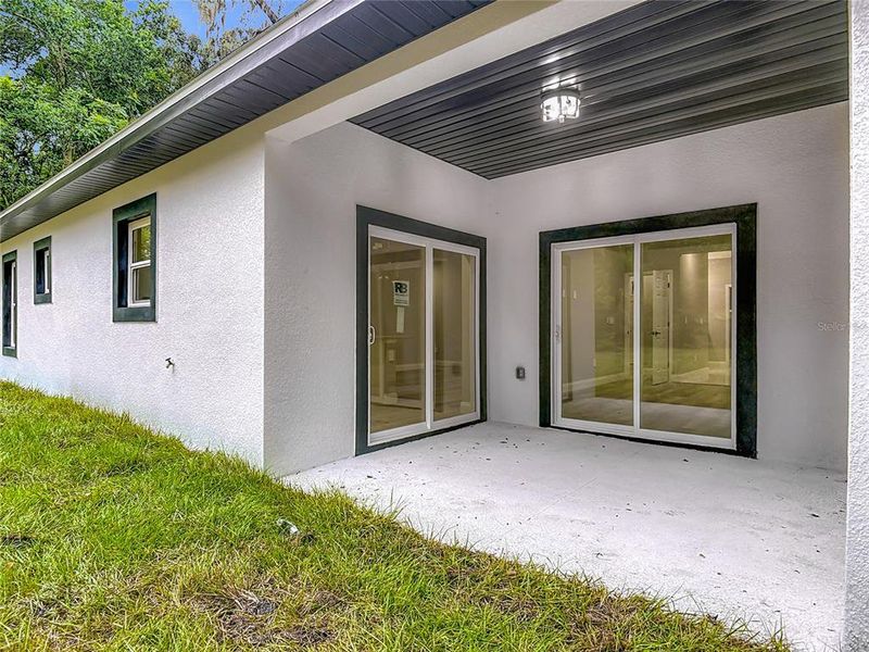 Exterior details and patio area of a home in , Deland (Image 24).