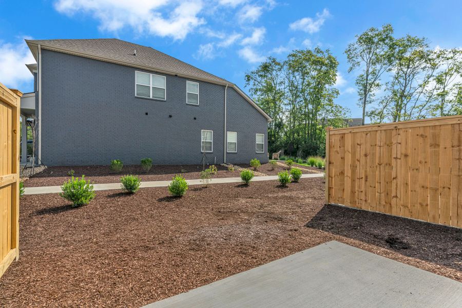 Front exterior of a new home in Oxford Station, Gallatin, TN, highlighting curb appeal (Image 18).