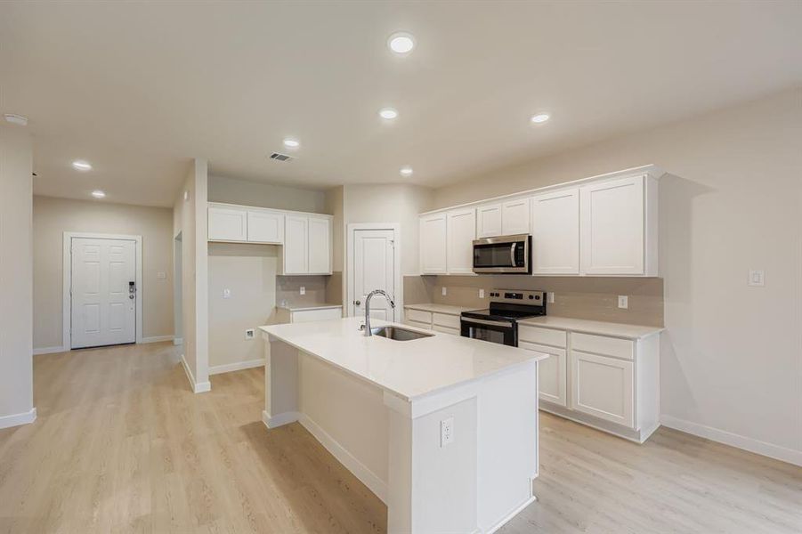 Furnished interior view inside a new home in MiraVerde, Crowley (Image 4). Furnished interior view inside a new home in MiraVerde, Crowley (Image 4).