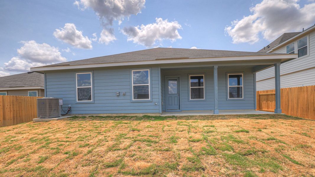 Front exterior of a new home in Trace, San Marcos, TX, highlighting curb appeal (Image 18).