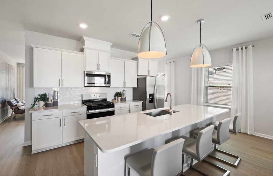 Furnished interior view inside a new home in Lakeside Townes at Riverlights, Wilmington (Image 11).