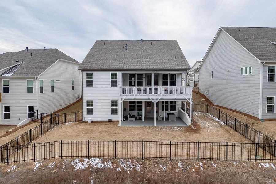 Front exterior of a new home in , Hoschton, GA, highlighting curb appeal (Image 19).