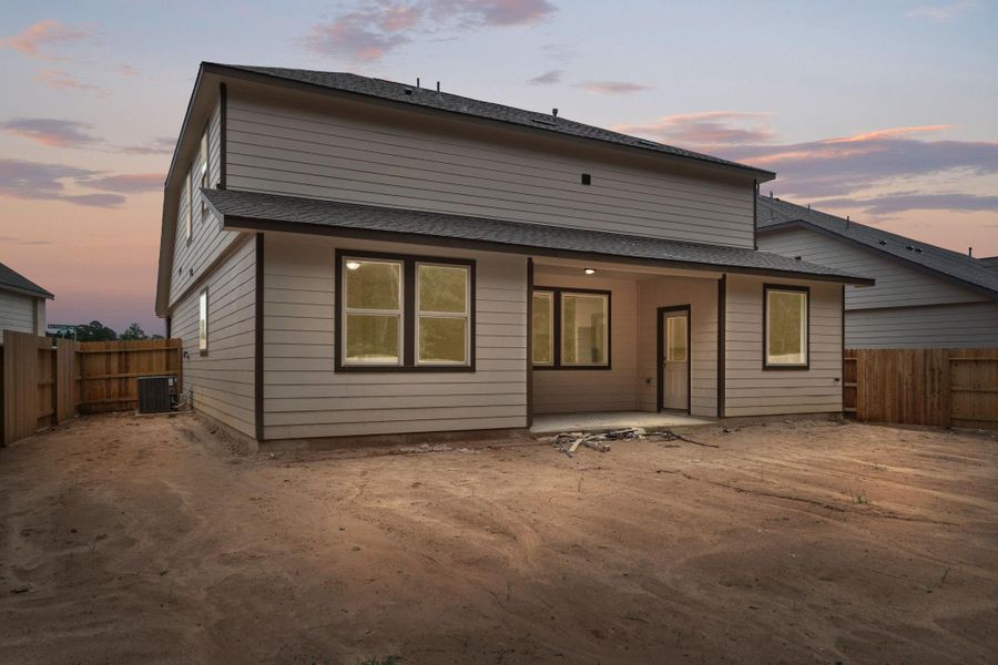 This backyard is perfect for family gatherings, social events, or simply unwinding in the fresh air. This backyard is perfect for family gatherings, social events, or simply unwinding in the fresh air.