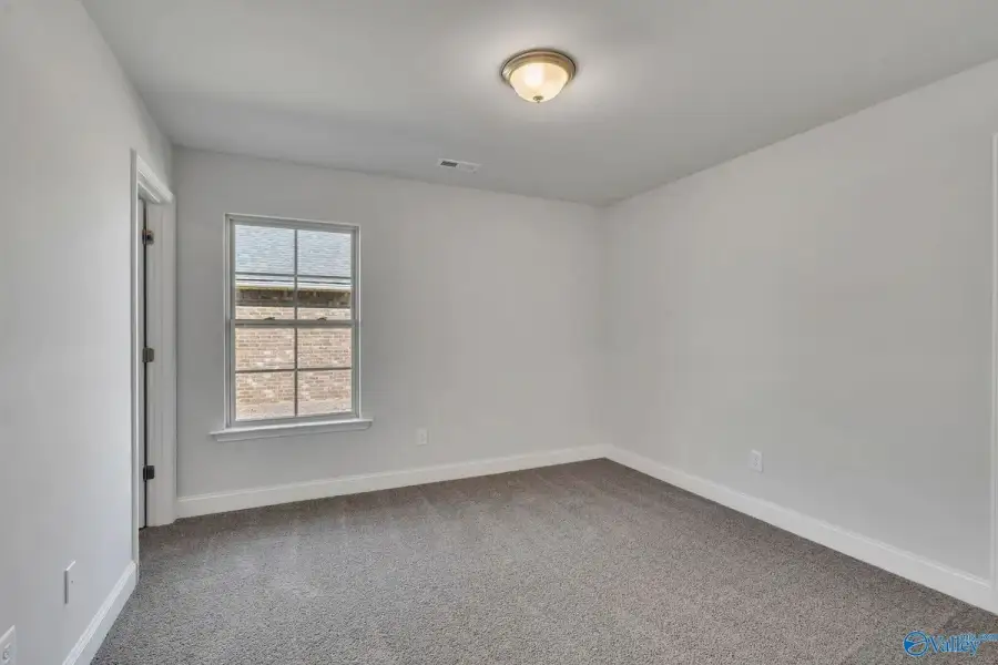 Spacious, unfurnished interior of a new home in Winding Oaks, Weeki Wachee (Image 21).