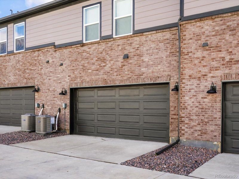 Front exterior of a new home in Horizon Uptown: The Meadow Collection, Aurora, CO, highlighting curb appeal (Image 20). Front exterior of a new home in Horizon Uptown: The Meadow Collection, Aurora, CO, highlighting curb appeal (Image 20).