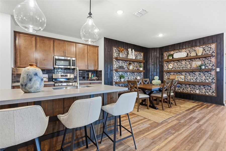 Model home photos of similar floorplans, not pictures of actual home.