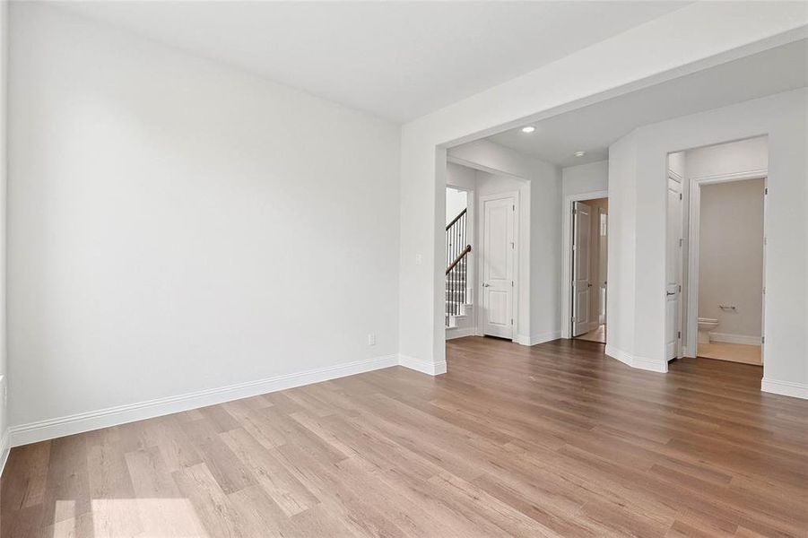 Spare room with light wood-type flooring