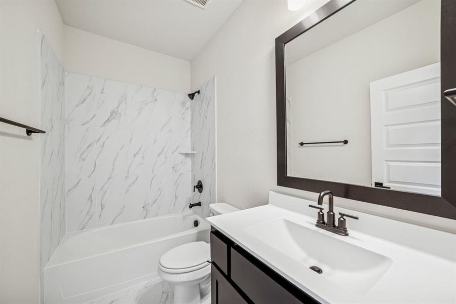 Furnished interior view inside a new home in Karis - Village Series, Crowley (Image 12). Furnished interior view inside a new home in Karis - Village Series, Crowley (Image 12).