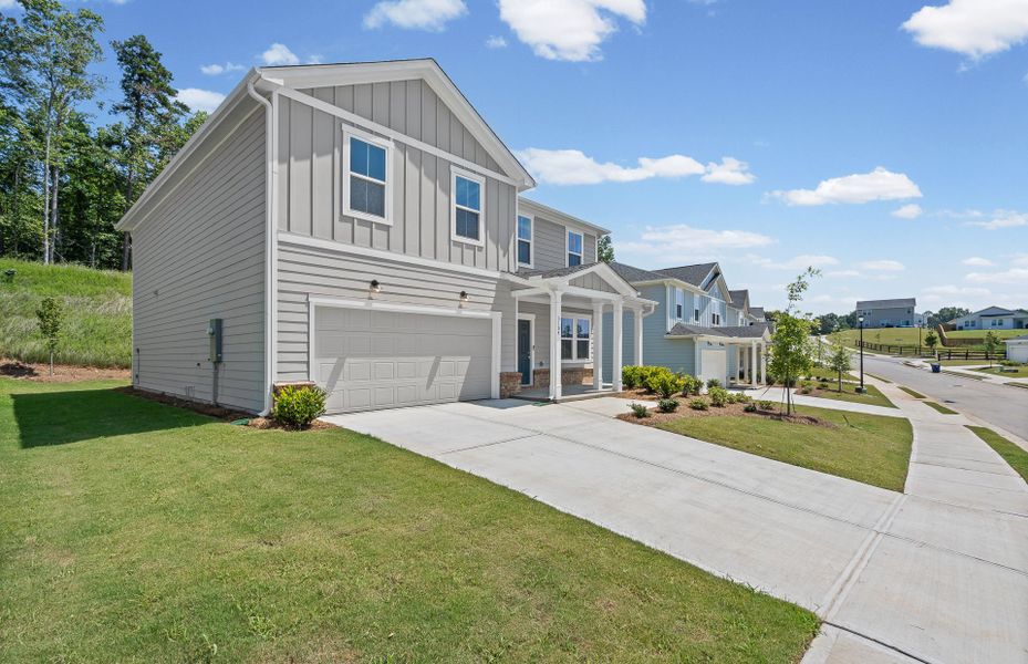 Front exterior of a new home in Avery Ridge, Gainesville, GA, highlighting curb appeal (Image 19). Front exterior of a new home in Avery Ridge, Gainesville, GA, highlighting curb appeal (Image 19).