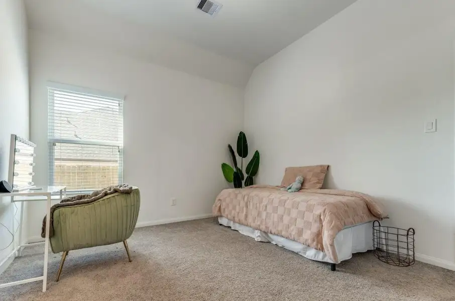 Furnished interior view inside a new home in Deer Pines, Conroe (Image 11).