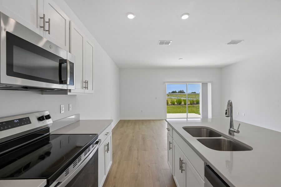 Furnished interior view inside a new home in Skye Ranch Community Group Page, Sarasota (Image 6).