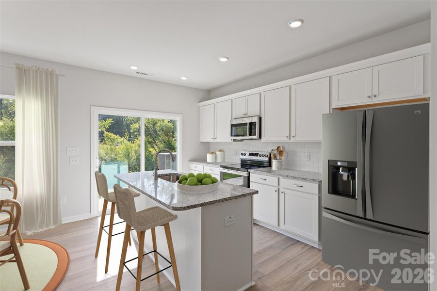 Furnished interior view inside a new home in Sloan Station, Charlotte (Image 10). Furnished interior view inside a new home in Sloan Station, Charlotte (Image 10).