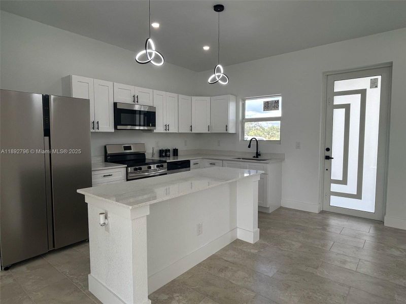 Furnished interior view inside a new home in , Lehigh Acres (Image 6). Furnished interior view inside a new home in , Lehigh Acres (Image 6).